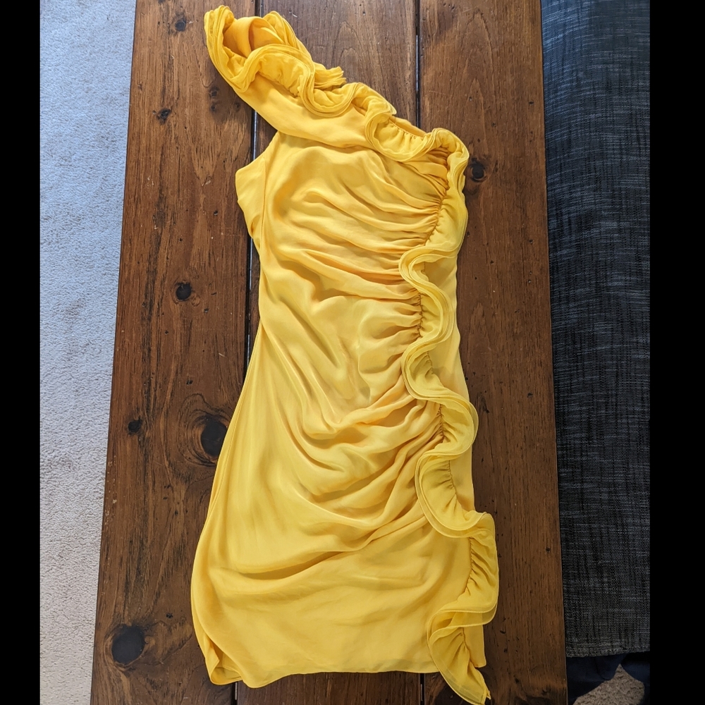 One shouldered mid-length.